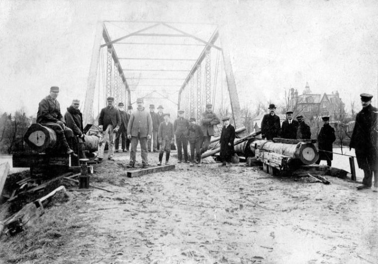 Protecting Park St. Bridge - Caleb Lincoln hauled the logs
